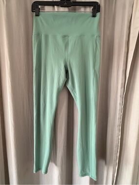 Vuori Stride Leggings, size medium, Celadon (green) color.